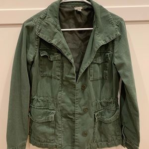 Women’s distressed army jacket. Good used condition. Size small.